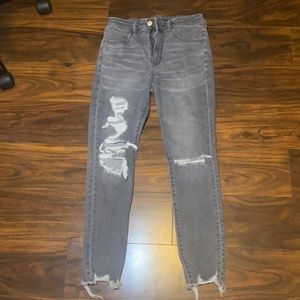 Grey American Eagle ripped skinny jeans